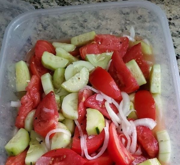 Marinated cucumber, onion and tomato