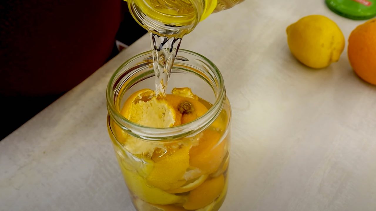 oranges and lemons in jar